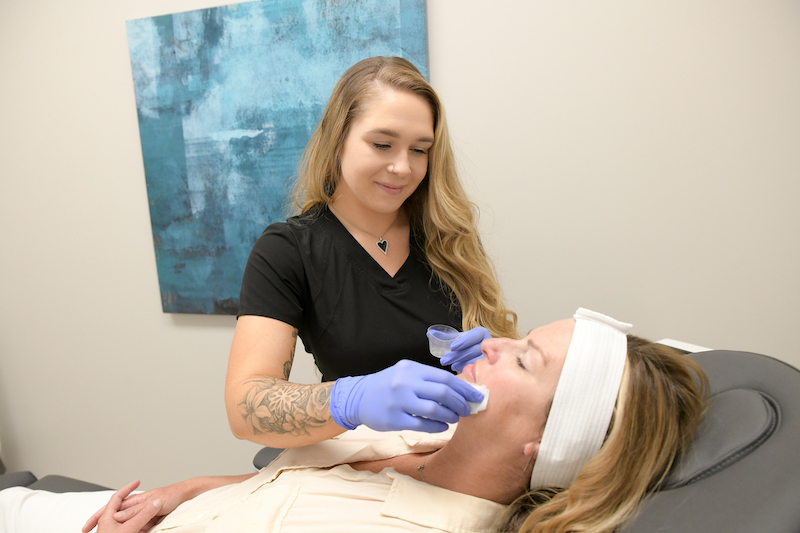 Patient receiving a chemical peel