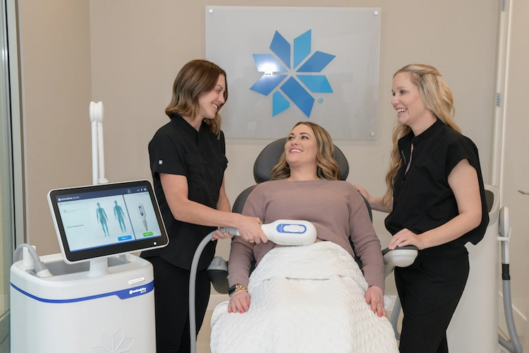 Happy patient getting a CoolSculpting treatment